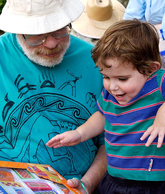 Grandpa Steve and Noah getting a birthday present; Decordova Museum, Lincoln, MA; ; Nikon D1X; 7/14/2002 1:44:47.5 PM; Color; Data Format: RAW (12-bit); Compression: None; Image Size: Large (3008 x 1960); Lens: 28-105mm f/3.5-4.5; Focal Length: 46mm; Exposure Mode: Aperture Priority; Metering Mode: Multi-Pattern; 1/200 sec - f/8; Exposure Comp.: +1/3 EV; Exposure Difference: 0 EV; Flash Sync Mode: Not Attached; Sensitivity: ISO 800; Color Mode: Mode II (Adobe RGB); Hue Adjustment: 3; White Balance: Direct sunlight; Tone Comp: Less Contrast; Sharpening: Normal