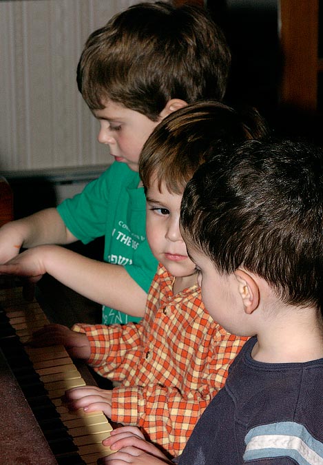 Benji, Noah and Eytan playing the piano; Williamstown, MA