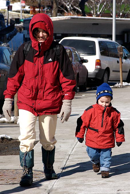 Anne and Noah walking on Staten Island after taking the ferry.