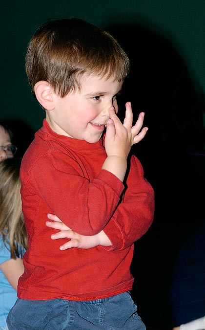 Noah being singled out to put hand on nose.; Eytan\'s birthday party.