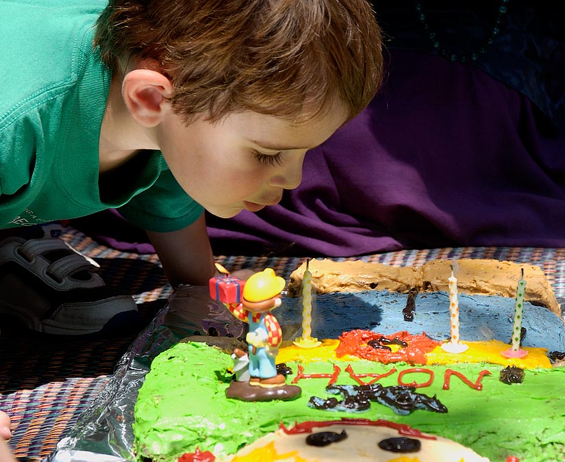 Noah blowing out the candles at his 3rd birthday party.