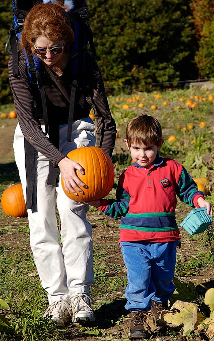 Barbara Haupt and Noah, picking a pumpkin at Carlson Orchards, Harvard, MA