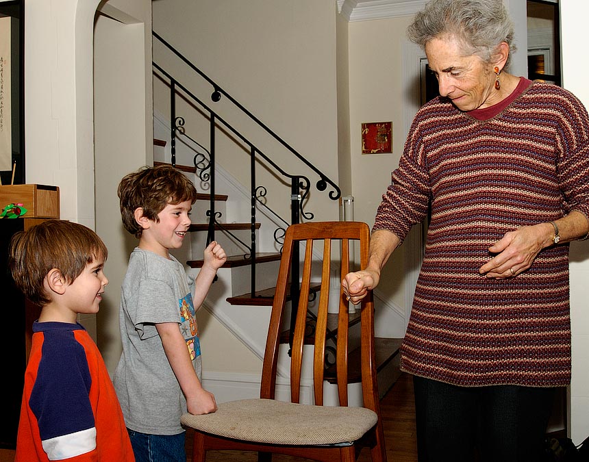 Eytan doing a magic trick for Grandma Tela - getting two balls to appear in her hand when it looked like he gave her one.; Newton, MA