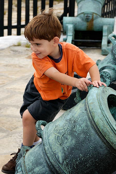 Noah climbing on a cannon at Fort Ticonderoga, NY