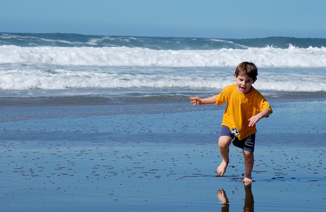 McClure\'s Beach, Pt. Reyes, CA; Noah running from surf
