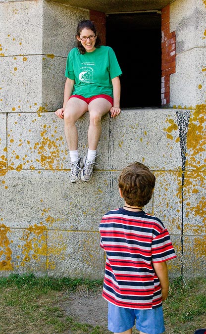 Jumping from a Fort Warren window.  Anne and Eytan.; Boston Harbor; MA; USA