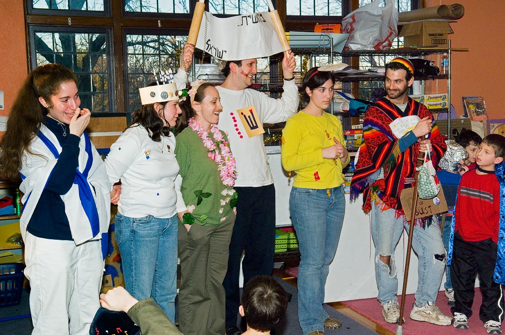 Purim Celebration; L-R:  Beth, Liz, Sarah, Steve, Loren, Andrew, Noah, Noah V., Ranen; Newton; MA; US