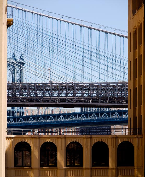 Brooklyn & Manhattan bridges through Watchtower building; Brooklyn; NY; US