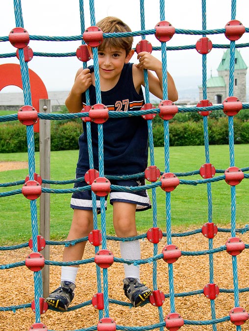 Noah climbing in a playground; Quebec; Quebec; CA