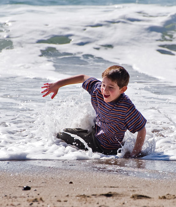 Noah not outrunning a wave; Point Reyes; CA; US