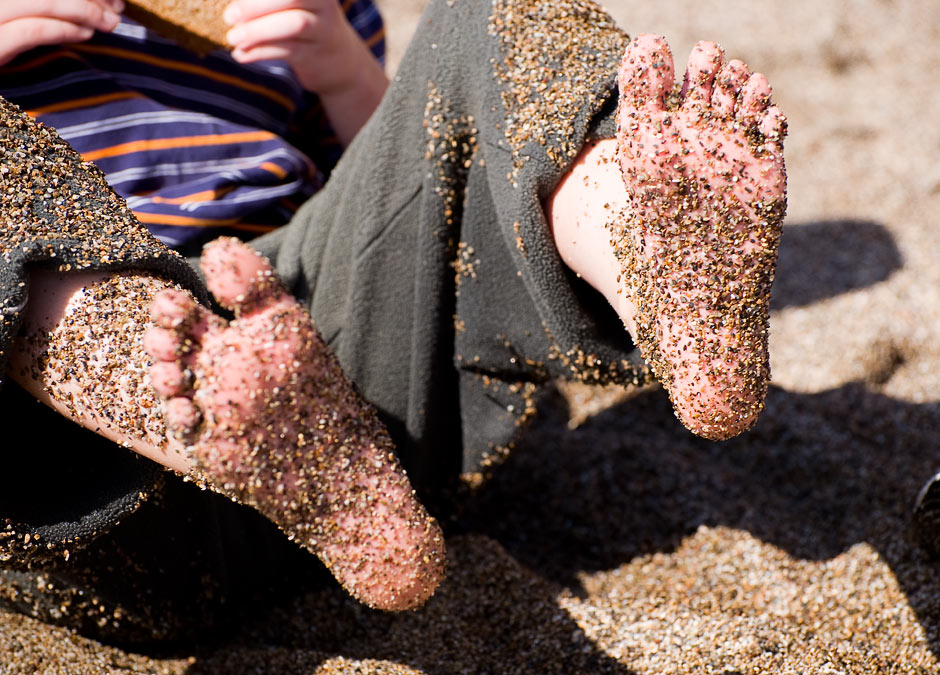 Noah\'s feet and coarse sand; Point Reyes; CA; US