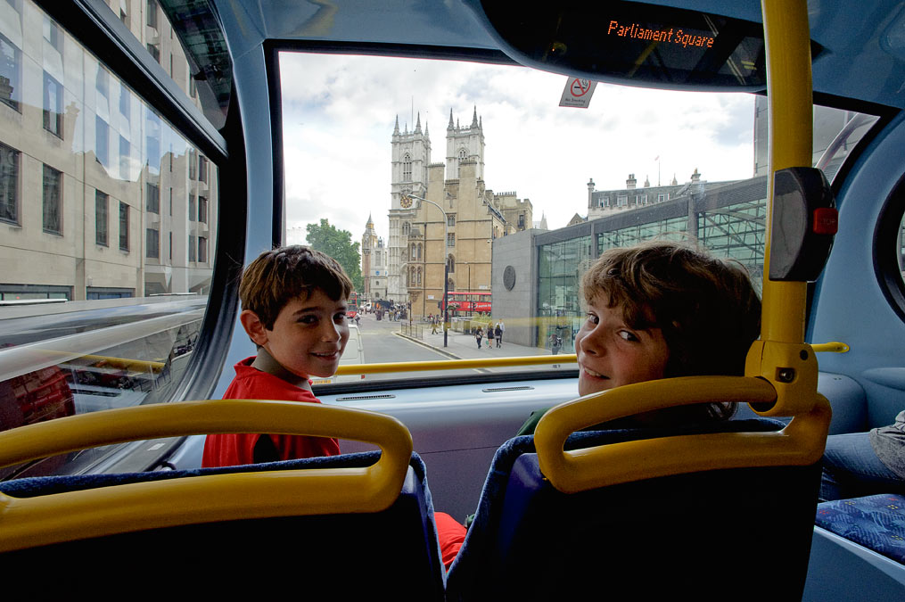 Noah, Eytan, Westminster Abbey, Big Ben and a double decker bus in one shot; London; MA; England