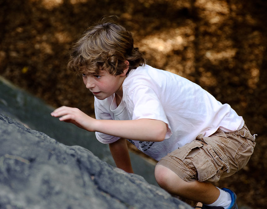 Eytan climbing rocks in Central Park; New York; NY; US