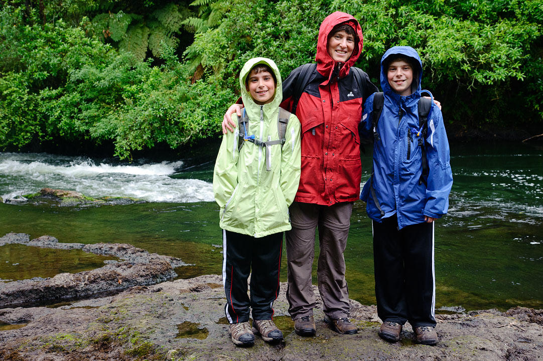 Hiking in the rain near Okere Falls; Noah, Anne and Eytan; Rotorua; North Island; New Zealand