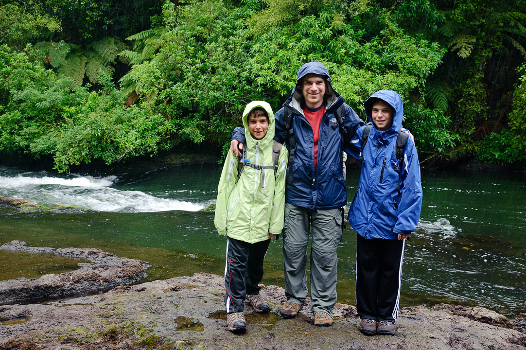 Hiking in the rain near Okere Falls; Noah, Michael and Eytan; Rotorua; North Island; New Zealand