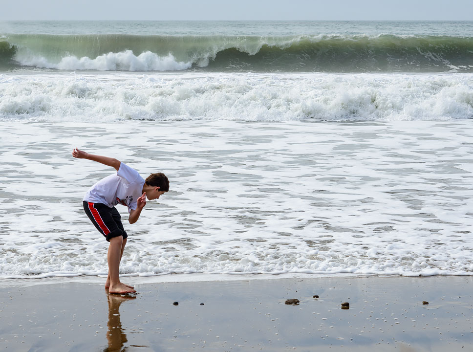 Noah running on the beach; A\\xf1o Nuevo; CA; USA